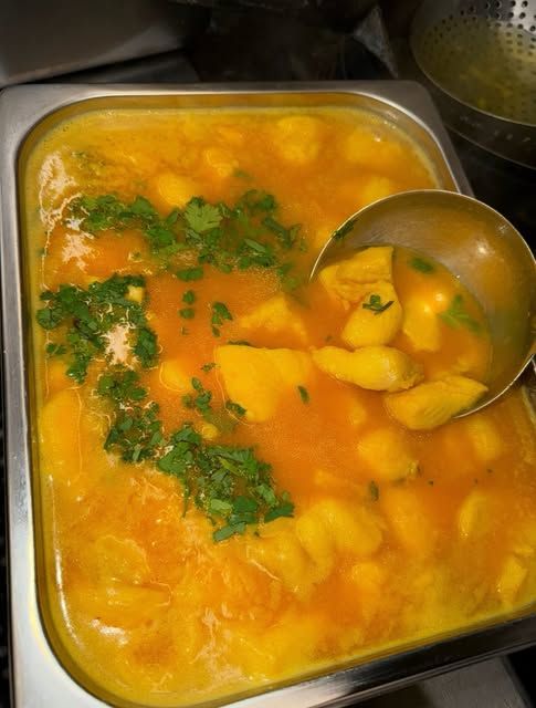 Hearty stew with plantains and fresh cilantro